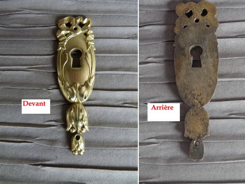 Entrée clé ancienne en bronze ruban et noeud Louis XVI
